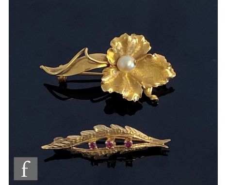 An 18ct brooch modelled as a flower and set with a single pearl, weight 5.8g, with a similar 9ct hallmarked ruby set leaf exa
