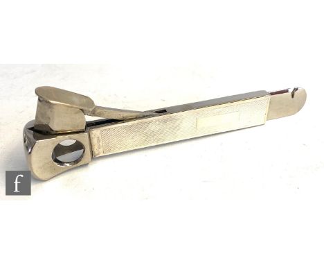 A modern hallmarked silver desk cigar cutter with engine turned decoration, length 15cm, Birmingham 1996. 