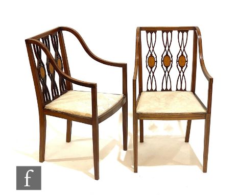 A pair of Edwardian satinwood crossbanded mahogany elbow chairs, interlaced spats each decorated with a shell paterae, on squ