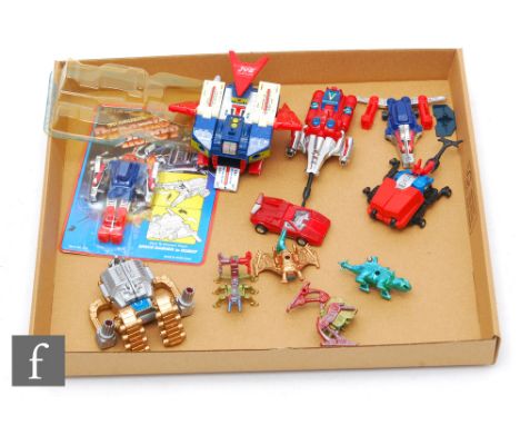 A collection of assorted transforming robot toys, to include a Hong Kong made Motorized Dynamic Robot.