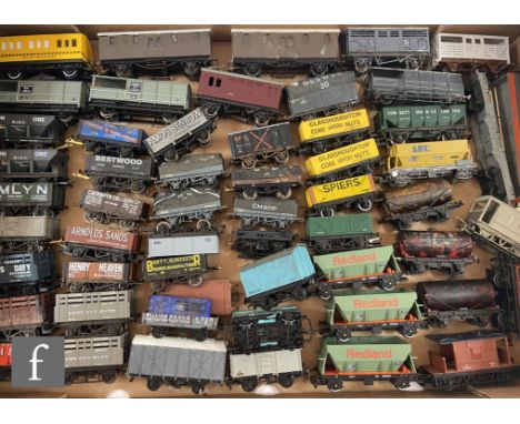 Fifty six OO gauge&nbsp;items of rolling stock by Hornby, Bachmann, Lima and others, to include trucks and wagons etc, unboxe