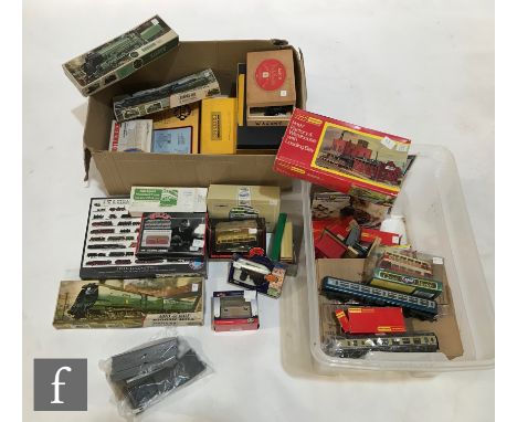 A collection of assorted OO gauge rolling stock, unboxed, together with a selection of Airfix locomotive plastic model kits, 