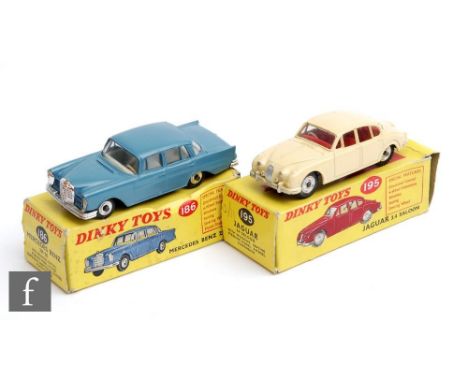 Two Dinky Toys diecast model cars, 186 Mercedes-Benz 220SE in RAF blue with ivory interior, cream steering wheel and spun hub