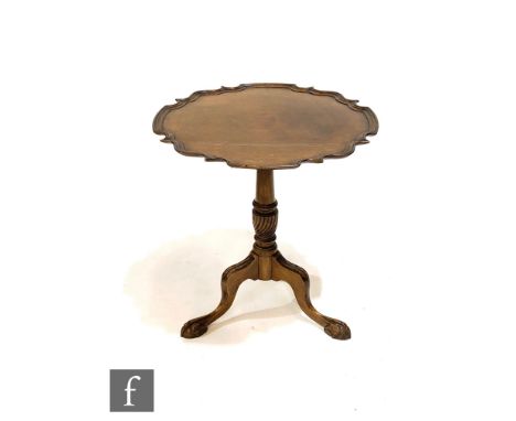 An early 20th Century mahogany pie crust tripod snap top occasional table, diameter 59cm. 