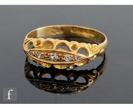 An early 20th Century 18ct hallmarked diamond five stone boat shaped ring, weight 2.1g, ring size O 1/2, Birmingham 1919. 