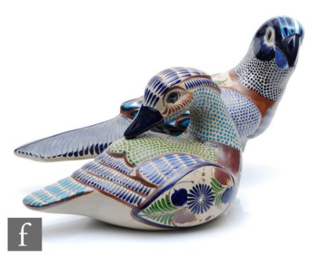 Two large contemporary Guadalajara Pottery of Mexico models of birds, both with enamel decoration over the buff ground, paint