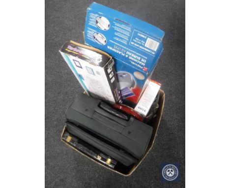 A box of carved plaque, wireless router, barometer, computer keyboard etc.