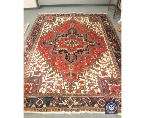 A Heriz carpet, Iranian Azerbaijan, 333cm by 251cm