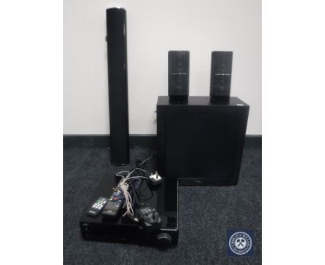 A Kef speaker together with JVC compact component system and surround speakers with remote control