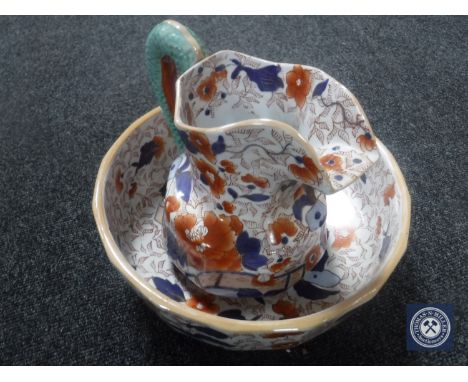 An ironstone jug and basin in Imari colours