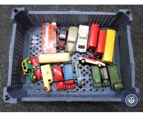 A crate of a quantity of die cast vehicles to include Dinky etc
