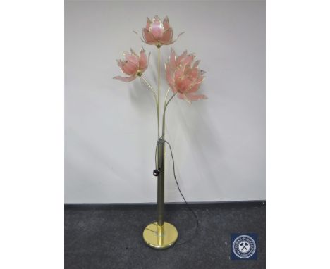 A brass and glass petal floor lamp