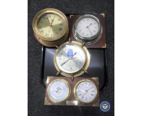 A tray of reproduction marine clocks, brass mounted barometer etc