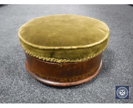A circular inlaid mahogany sewing box/stool