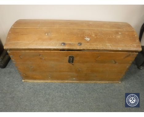 A 19th century pine dome top trunk, width 117cm