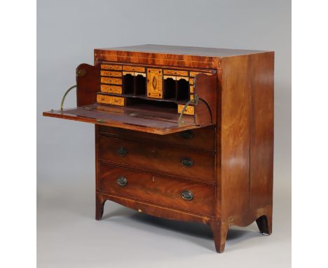 A 19th century inlaid mahogany secretaire chest, the fitted interior with central satinwood cupboard door surrounded by small