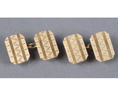 A pair of 9ct. gold cufflinks with rectangular engine-turned panels; 5.3gm.