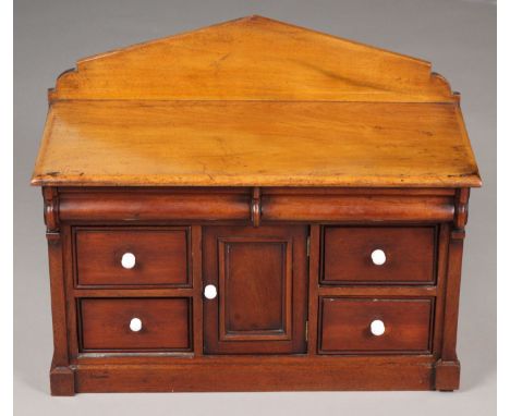 A late Victorian ‘apprentice-piece’ mahogany sideboard with triangular pediment, panelled sides, &amp; fitted four drawers ab