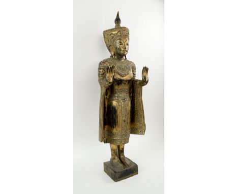 THAI BUDDHA FIGURE, gilt carved wood on block base, approx 86cm H overall (finial with fault).