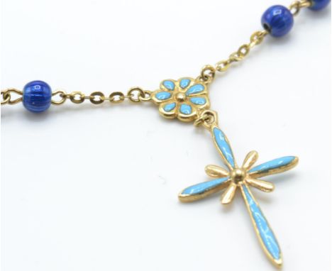 An Italian 18ct gold pearl and enamel pendant bracelet. The bracelet strung with a gold and enamel cruciform pendant having e
