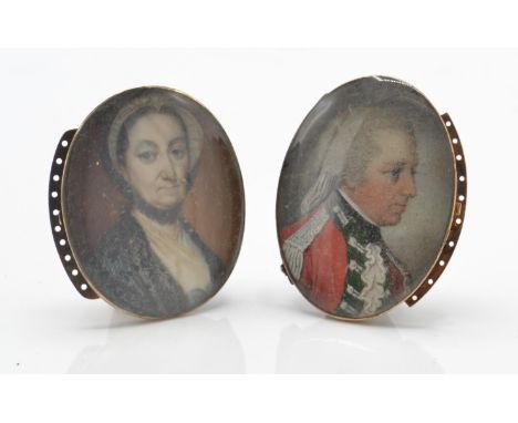 Two 19th century Miniature mourning jewellery portrait bracelet clasps. The oval portraits being of a gentleman in regimental