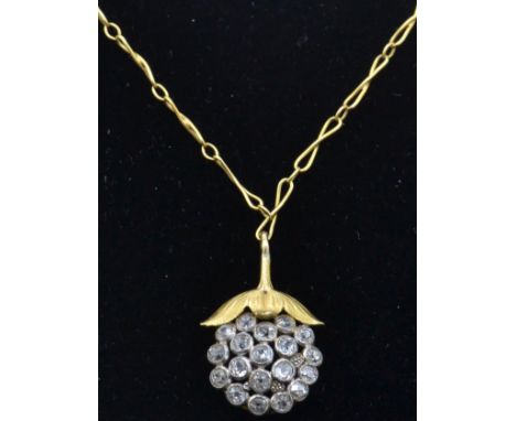 An 18ct gold and diamond pendant necklace. The necklace strung with a pendant in the form of a berry being set with a&nbsp; c