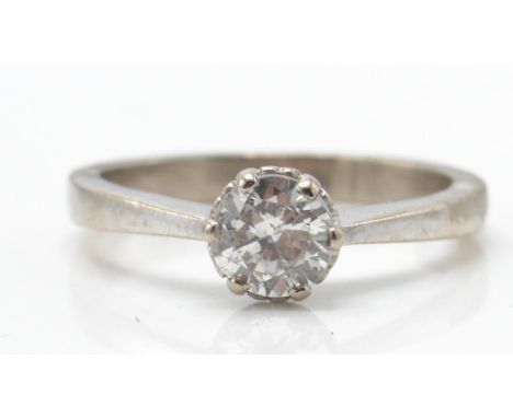 A hallmarked 18ct white gold and diamond solitaire ring. The ring set with a round brilliant cut diamond of approx estimated 