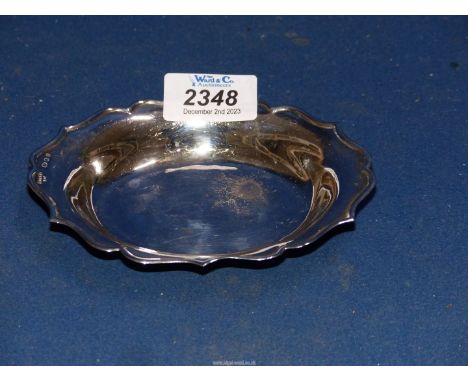 A Silver trinket Dish with shaped edge, London 1970, makers A. Chick & Sons Ltd., 5 1/4" x 4".