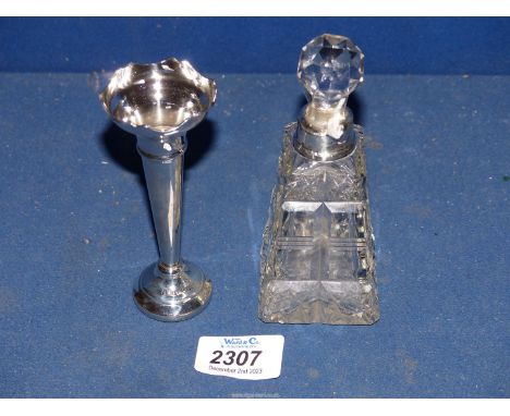 A silver posy vase, Birmingham 1986, 4 1/2" tall and a glass slice cut square scent bottle and stopper with silver collar, ma