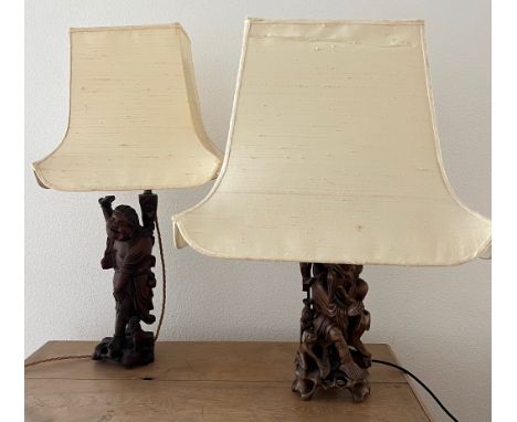 Two carved Oriental lamp bases