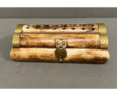 A Bone carved trinket or jewellery box with brass fittings