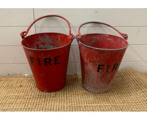 Two vintage red fire buckets 