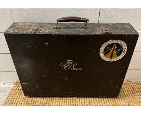 A prop masters wooden tool box with Moonraker sticker