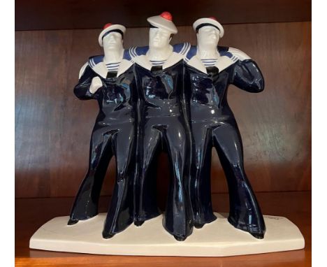 A china figure of a sailor by Fab Quimper ware (H31cm W35cm)