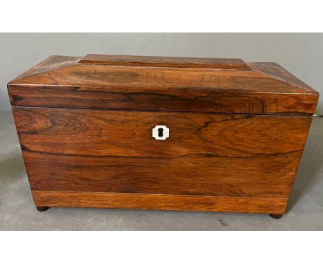 A Rosewood sarcophagus shaped tea caddy with loop handles (32cm x 16cm x 16cm)
