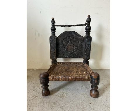 A vintage Punjabi low wedding chair with carved back and turned legs (H72cm W46cm D46cm SH18cm)