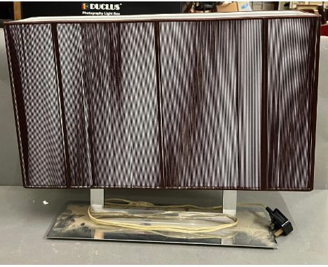 A chrome twin arm lamp 