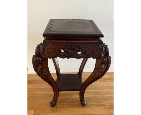 A Chinese hardwood lamp table on ornate curved legs (43cm sq x 75cm H)
