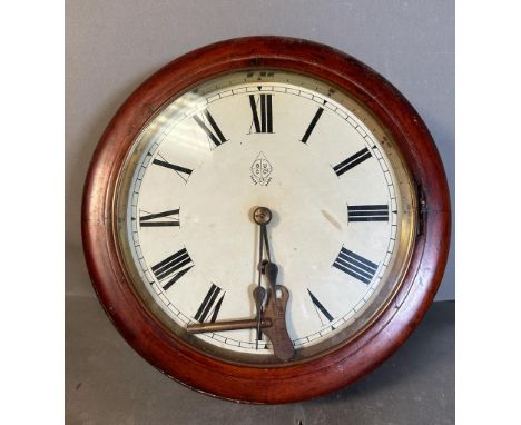 A mahogany cased BUC co station clock