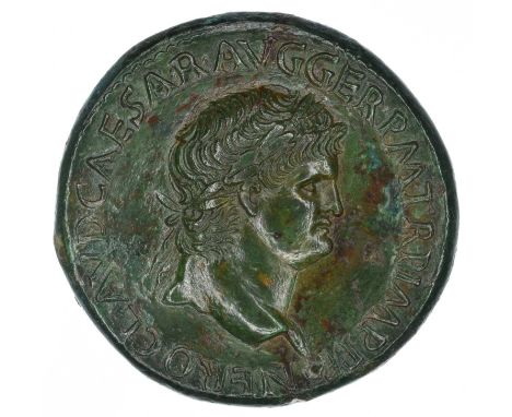 Nero Æ Sestertius. Lugdunum, circa AD 65. NERO CLAVD CAESAR AVG GER P M TR P IMP P P, laureate head right, globe at point of 