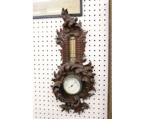 Late 19th / Early 20th century Wall Barometer / Thermometer contained in a Rococo style Scrolling Carved Frame, 58cm high (gl