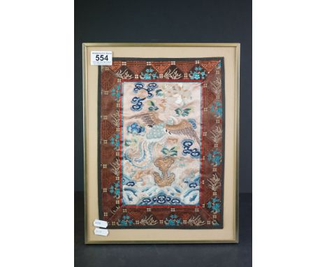 Chinese Embroidered Silk Panel depicting an Exotic Bird, 23cm x 30cm, framed and glazed 