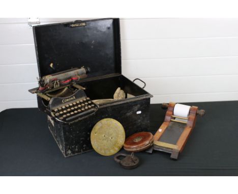 A mid 20th century metal storage trunk containing mixed collectables to include typewriter, tape measure ..etc. 