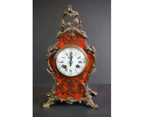 A late 19th century French made mantle clock with chiming movement, marked Made in Paris. 