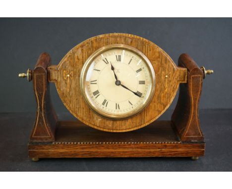 Oak veneered Hamburg American Company mantle clock with unusual swivel design 