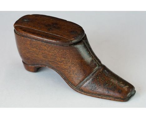 A 19th century treen wooden shoe snuff box with sliding lid. 