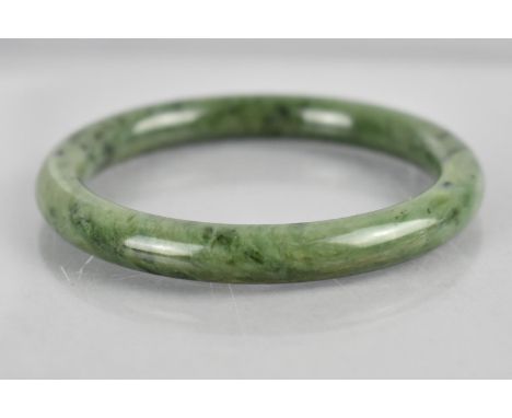 A Chinese Nephrite Jade Bangle, Interior Dimensions 58mm