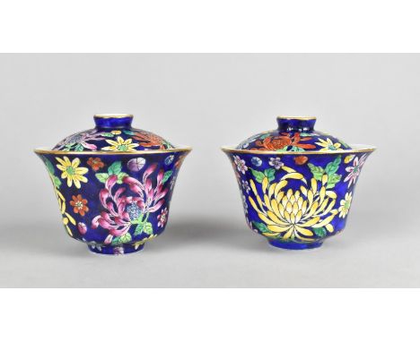 A Pair of Chinese Porcelain Tea Bowls and Covers Decorated in Coloured Enamels Detailing Flowers on Blue Ground, Red Seal Mar