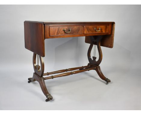 A Reproduction Mahogany Drop Leaf Sofa Table with Two Drawers and Lyre Supports, 88cm Wide