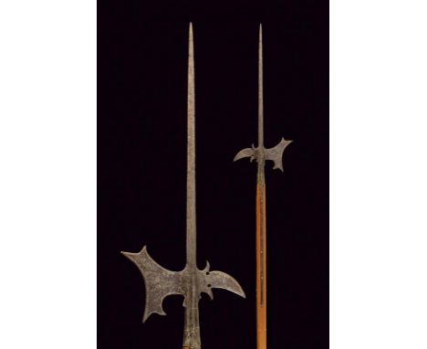 dating: 19th Century provenance: Italy, Cusp of lozenge section, hollow axe, rear fluke pierced at the base. Long straps. Mod